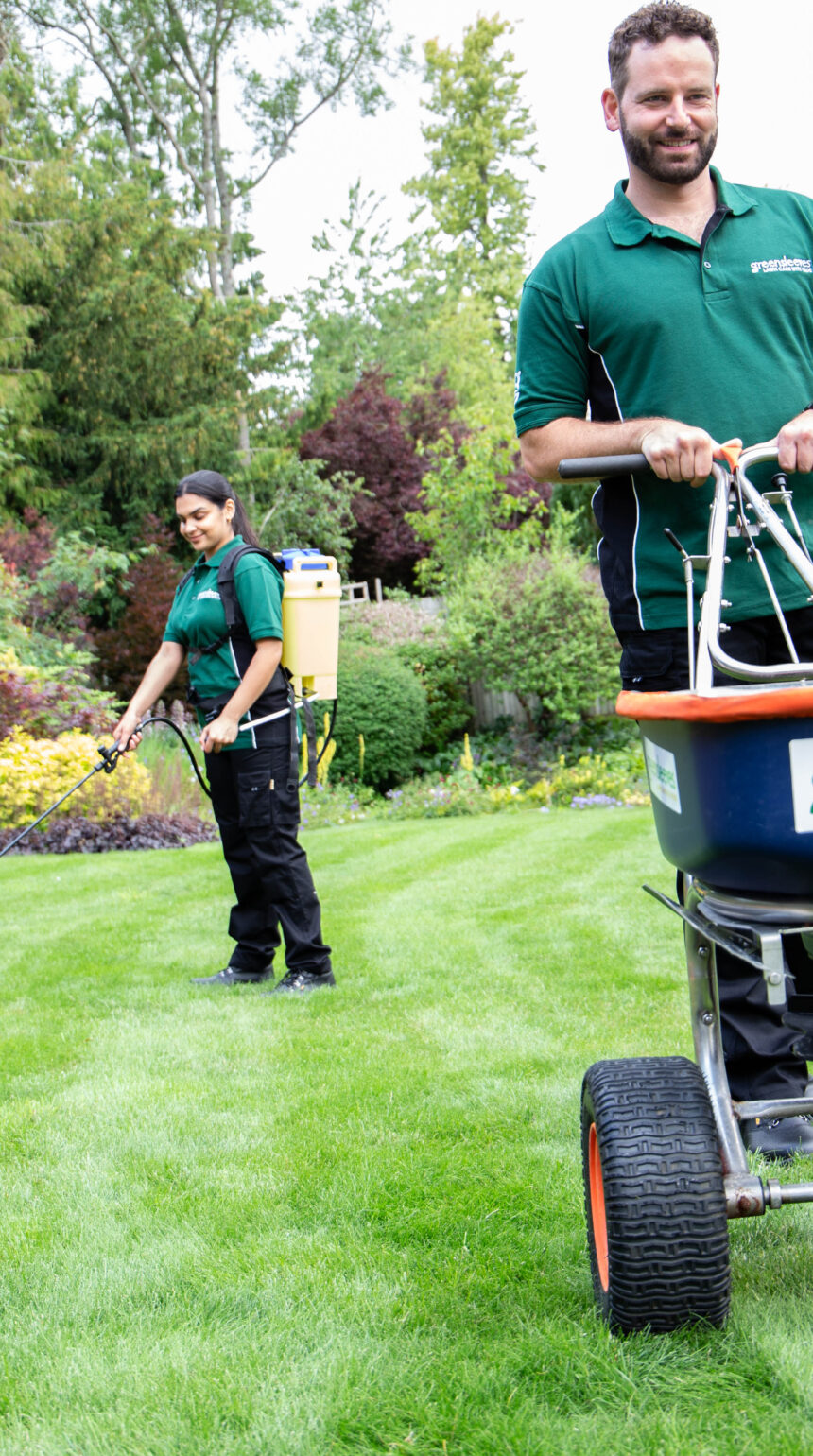 Greensleeves lawn experts completing treatment on lawn