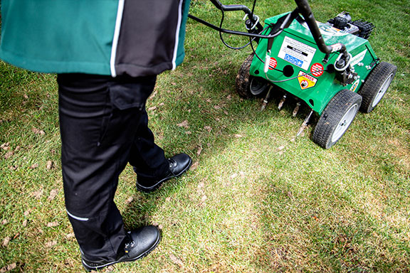 Close up shot of the rear of an aeration machine showing how it works