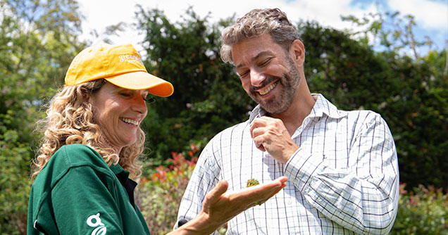 Greensleeves lawn expert talking with a customer